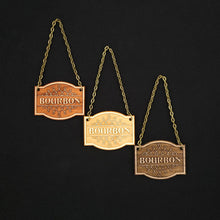 Load image into Gallery viewer, Laser engraved decanter tags made from cherry, maple and walnut reading &quot;Bourbon&quot; add a beautiful vintage touch to your bar
