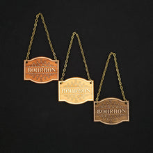 Load image into Gallery viewer, Laser engraved decanter tags made from cherry, maple and walnut reading "Bourbon" add a beautiful vintage touch to your bar