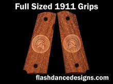 Load image into Gallery viewer, Full sized 1911 grips in cocobolo, stippled background with a spartan helm