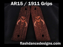 Load image into Gallery viewer, Walnut AR 1911 grips laser engraved with a popular bounty hunter logo over a stippled background