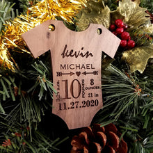 Load image into Gallery viewer, Commemorate the new baby in your life with this darling holiday ornament. This one of a kind item makes a perfect gift any time of year.  Customized with the baby's first & middle name, birth weight & length, and date & time of birth. Available in maple, walnut or cherry woods.