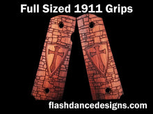 Load image into Gallery viewer, Walnut full sized 1911 grips laser engraved with a crusader shield over a castle wall background