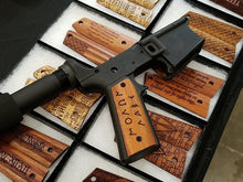 Load image into Gallery viewer, A set of AR 1911 grips mounted on the Pearce AR-15 Grip Adapter