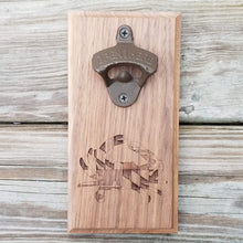 Load image into Gallery viewer, Hardwood bottle opener measuring 4" x 8", laser engraved with a blue crab and Maryland flag design. The bottle opener includes a rare earth magnet to hold bottle caps.