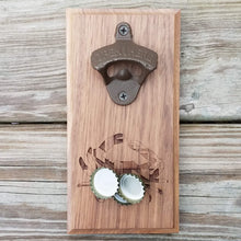 Load image into Gallery viewer, Hardwood bottle opener measuring 4" x 8", laser engraved with a blue crab and Maryland flag design. The bottle opener includes a rare earth magnet to hold bottle caps.