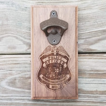 Load image into Gallery viewer, Custom laser engraved hardwood bottle opener measuring 4" x 8". This example shows the Montgomery County MD police officer's badge. The bottle opener includes a rare earth magnet to hold bottle caps.