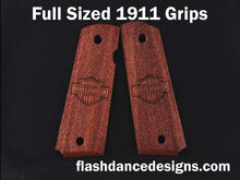 Load image into Gallery viewer, Walnut full sized 1911 grips laser engraved with a motorcycle logo over a stippled background
