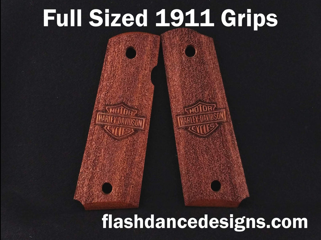 Walnut full sized 1911 grips laser engraved with a motorcycle logo over a stippled background