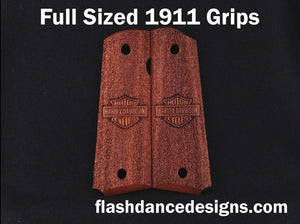 Walnut full sized 1911 grips laser engraved with a motorcycle logo over a stippled background