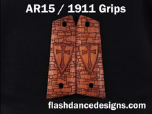 Load image into Gallery viewer, Walnut AR 1911 grips laser engraved with a crusader shield over a castle wall background
