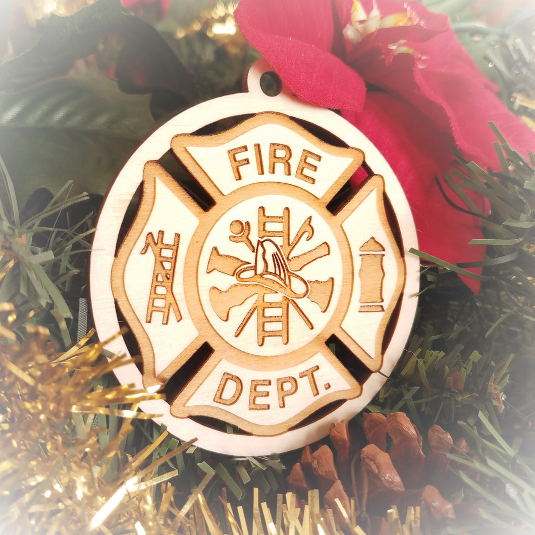 Laser engraved birch Christmas ornament featuring a fire fighter emblem in a Maltese cross.