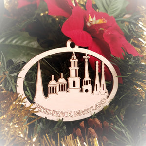 Laser engraved birch Christmas ornament featuring the Clustered Spires of Frederick, Maryland