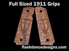 Load image into Gallery viewer, Walnut full sized 1911 grips laser engraved with a crusader shield over a castle wall background
