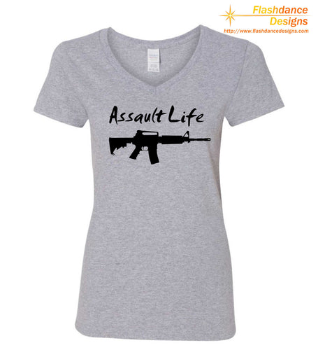 Silhouette of one of several modern military style rifles with the words Assault Life written above all printed on a heavy cotton ladie's v-neck tee. Available in multiple color combinations.