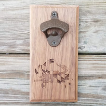 Load image into Gallery viewer, Hardwood bottle opener measuring 4&quot; x 8&quot;, laser engraved with a blue crab and Maryland flag design. The bottle opener includes a rare earth magnet to hold bottle caps.
